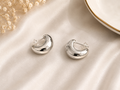Aretes Plateados Tipo Huggie
